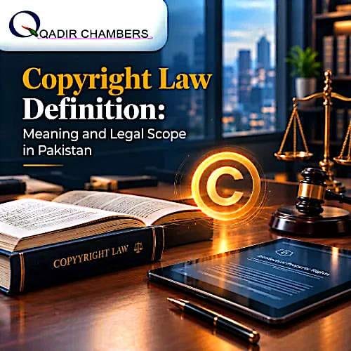 Legal concept image showing Copyright Law books, gavel, scales of justice, and copyright symbol on desk in a law office with text overlay "Copyright Law Definition: Meaning and Legal Scope in Pakistan" by Qadir Chambers.